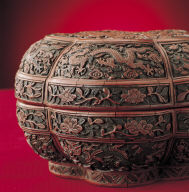 Carved polychrome lacquer box in the shape of plum-blossom with cloud dragon decor