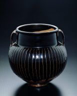 Black-glazed jar with raised striations