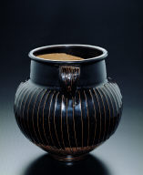 Black-glazed jar with raised striations