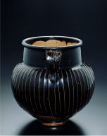 Black-glazed jar with raised striations