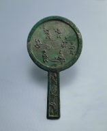 Bronze mirror with scene of children at play (from the story Yan-shan wu-gui)