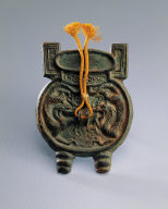 Bronze mirror with ding-shaped and double-dragon design