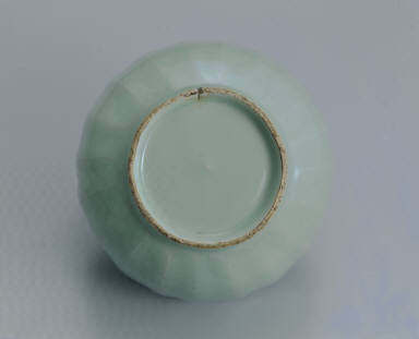 Celadon bowl with lotus petal decor