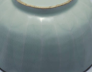 Celadon bowl with lotus petal decor