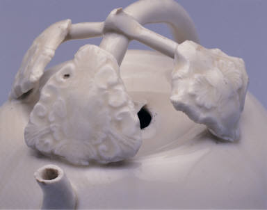 Gourd-shaped ewer with vine handle in white glaze