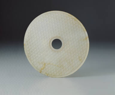 Jade bi disk with nipple design