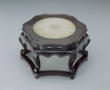 Jade bi disk with nipple design