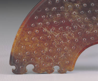Segmented jade bi disk