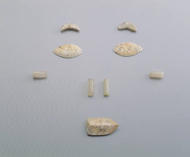 Jade-like stone funerary ornament for face-shroud