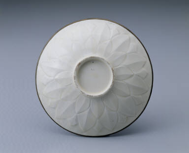 Dish with carved lotus petals and incised decor in white glaze