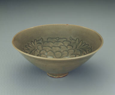 Bowl with incised peony decor in yellowish-green glaze