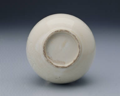 Long-necked vase with incised lotus design in white glaze