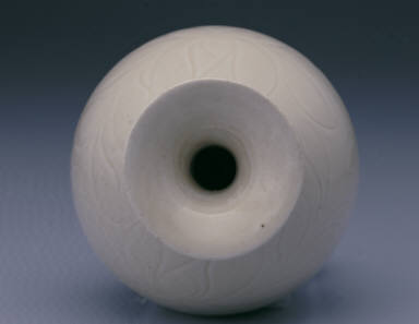 Long-necked vase with incised lotus design in white glaze