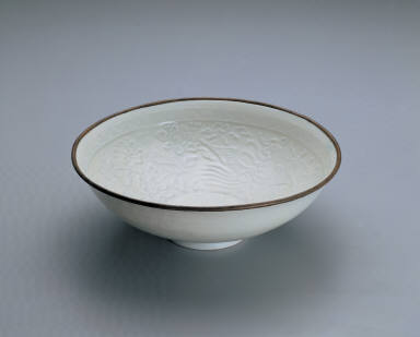 Translucent-blue glazed bowl with impressed double-phoenix design