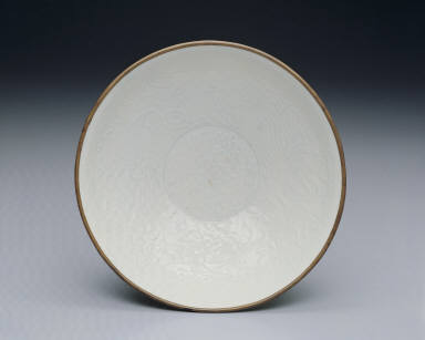 Translucent-blue glazed bowl with impressed double-phoenix design