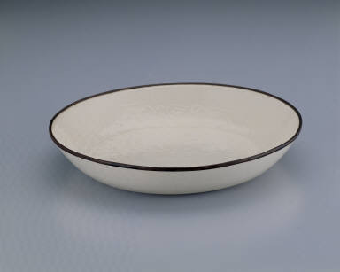 Dish impressed with deer design in white glaze