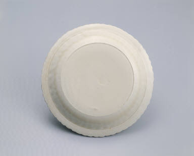 Dish with impressed design of peonies and pleated rim in white glaze