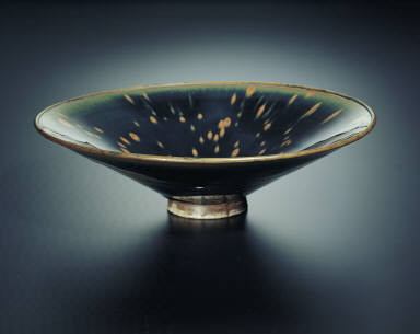 Black-glazed bowl with painted partridge's speckling splashes