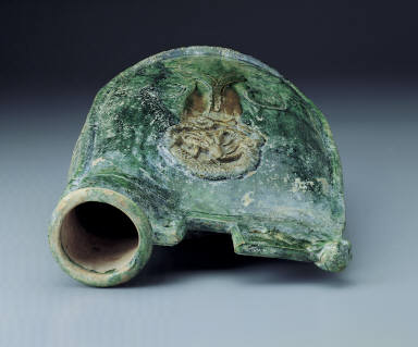 Green-glazed ewer in the shape of a leather pouch