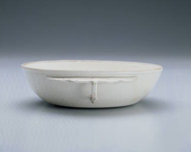 Cup with ear handle in white glaze