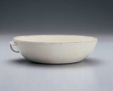 Cup with ear handle in white glaze