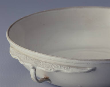 Cup with ear handle in white glaze