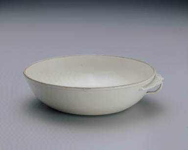 Cup with ear handle in white glaze