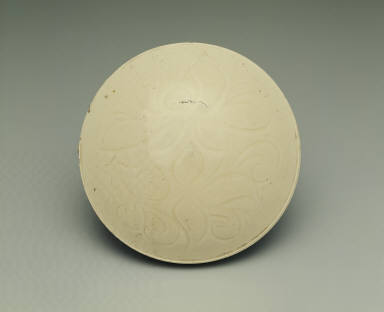 Box with incised day lily design in white glaze