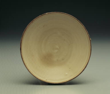 Box with incised day lily design in white glaze