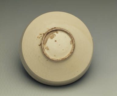 Box with incised day lily design in white glaze