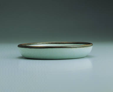 Dish with feng-hua inscription in light bluish-green glaze
