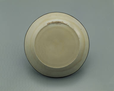 Dish with impressed motif of six chi dragons in white glaze