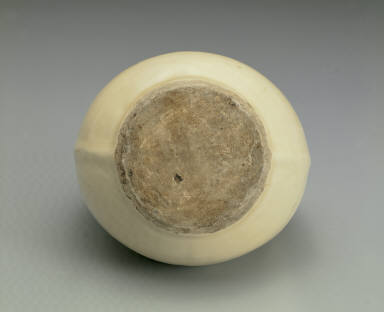 White-glazed ewer in the shape of a leather pouch