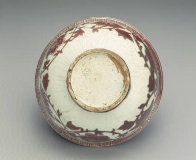 Bowl with floral design in underglaze red