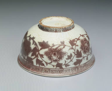Bowl with floral design in underglaze red