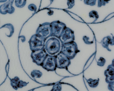 Lotus-shaped dish with floral design in underglaze blue