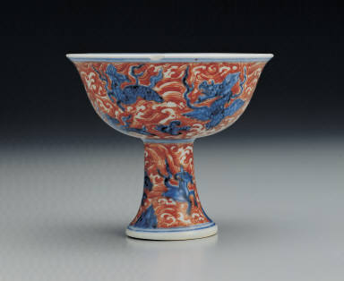 Stem cup with underglaze blue and overglaze red decoration of billows and sea animals