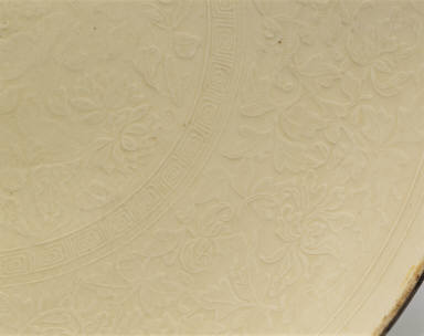 Large dish with impressed floral design