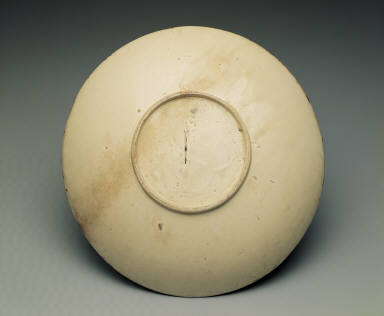 Large dish with impressed floral design