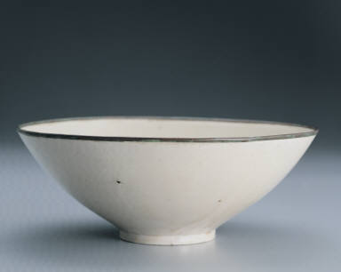 Bowl impressed with flowers of the four seasons in white glaze
