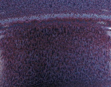 Planter with blue and violet glaze