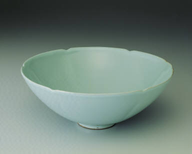 Bowl with hibiscus rim in light bluish-green glaze