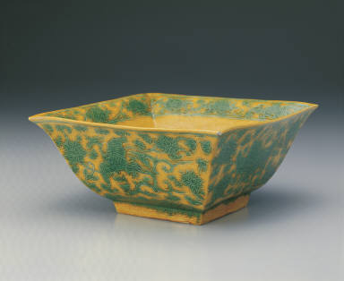 Square brush washer with incised phoenix design in green and bright yellow enamels