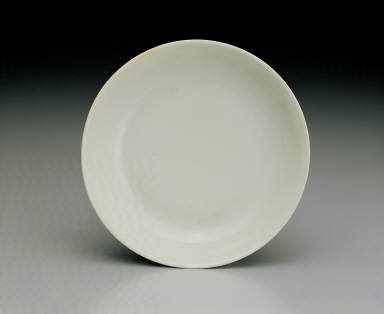 Dish with flowers and fruits in red enamel