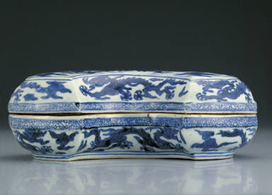 Silver ingot-shaped box with clouds and dragons in underglaze blue