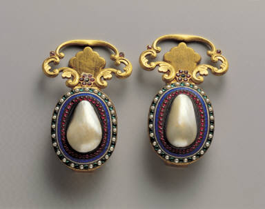 Pair of Silver belt plaque