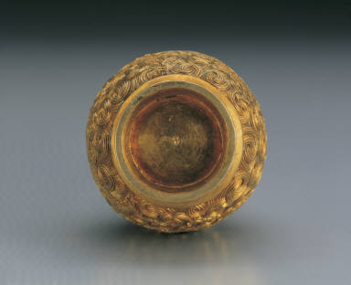 Gold vase with dragon decor