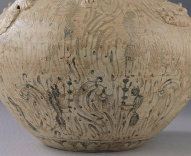 Covered jar in celadon glaze with underglaze painting of winged figure