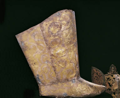 Silver boots with chased design