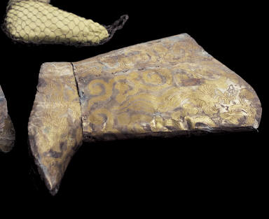 Silver boots with chased design